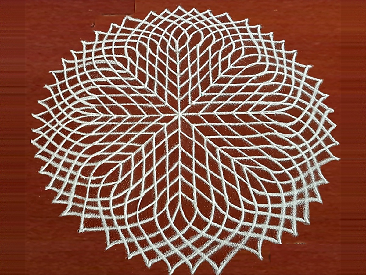 Sahasradala Padma 1000 Petal Sacred Lotus Kolam by Vinns on authentic red oxide terracotta floor